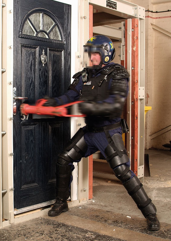 Police attempting to breach door