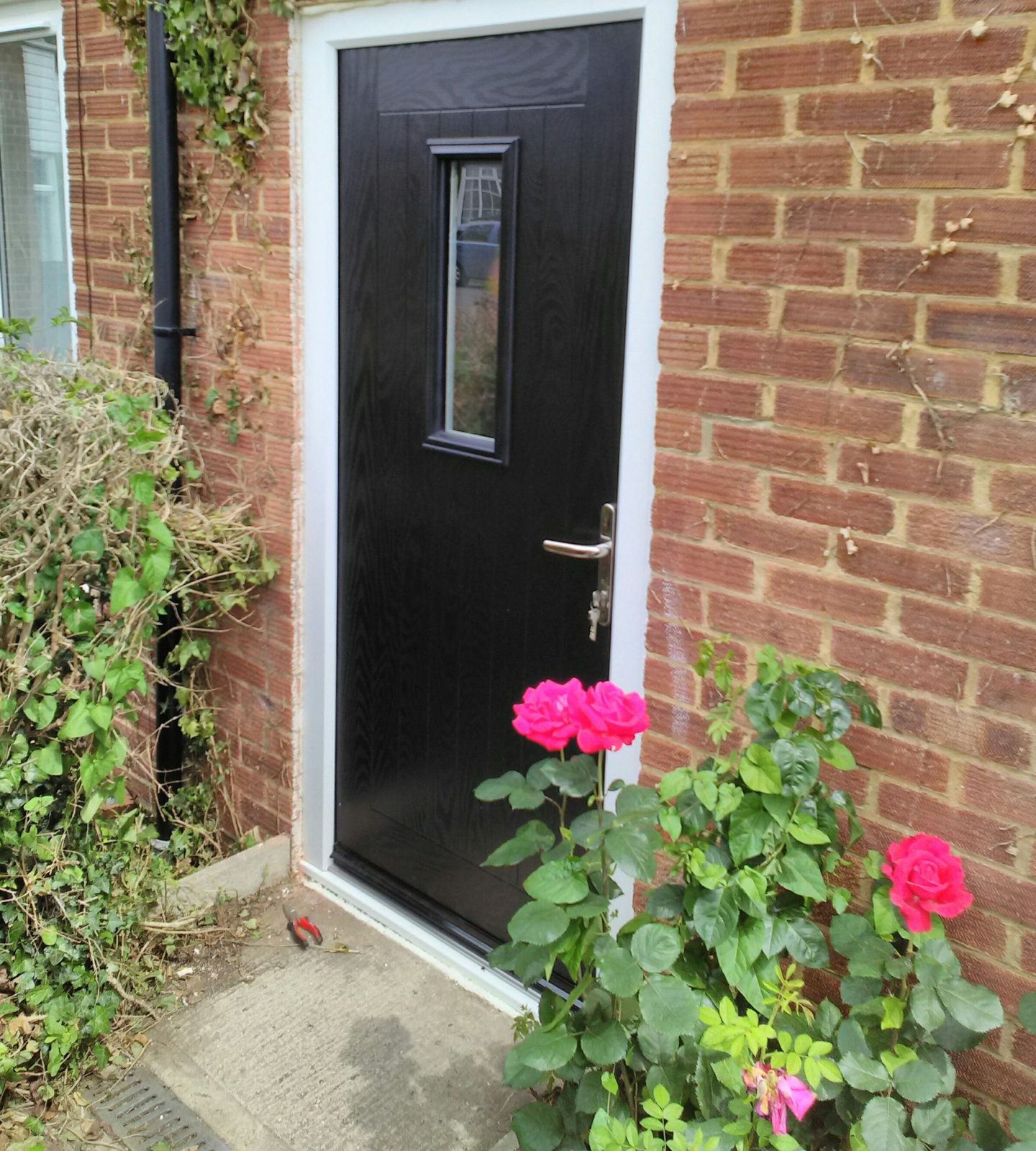 black composite front door