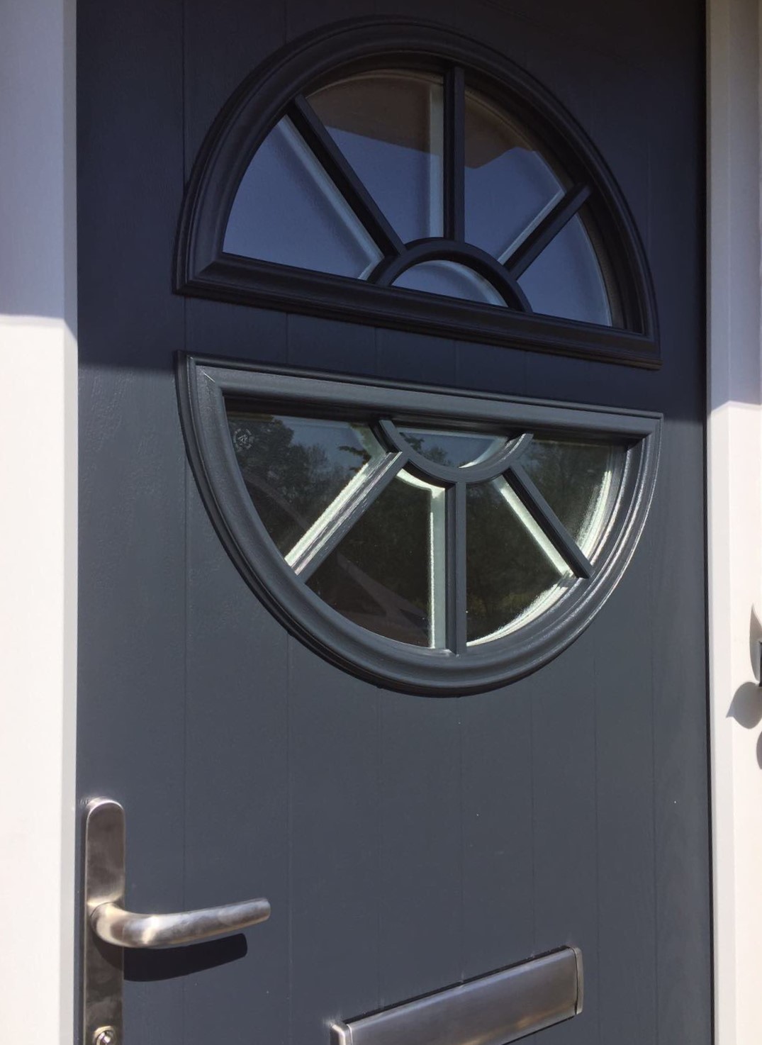 slate grey composite front door with half moon crescent windows