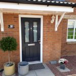 Black composite door with etched glass