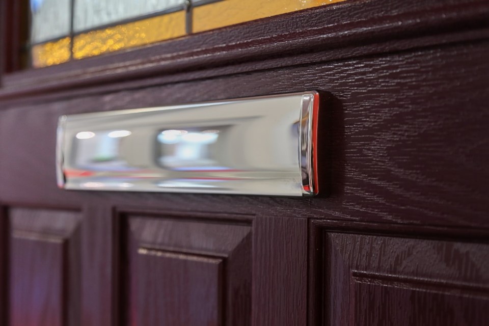 close up shot of a sliver letterbox.